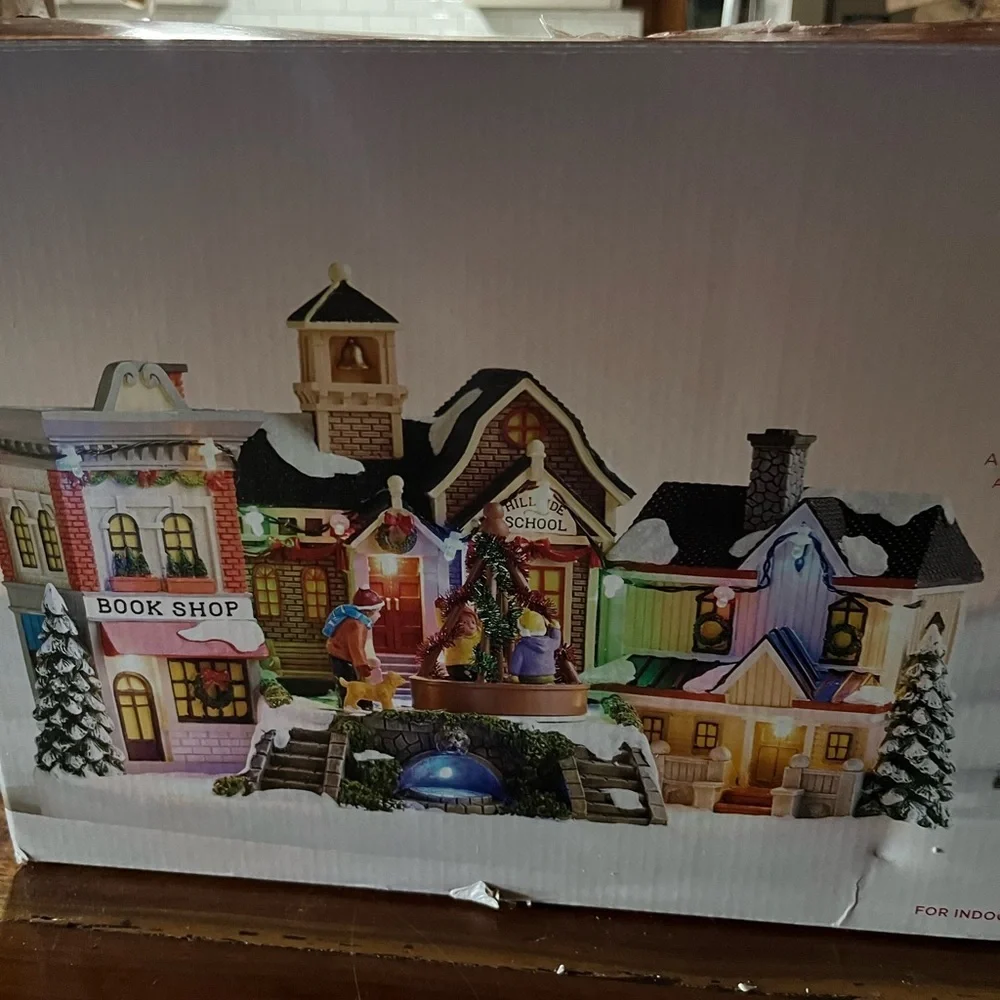 St. Nicholas Square Holiday Village with Green and Red Accents. Animated